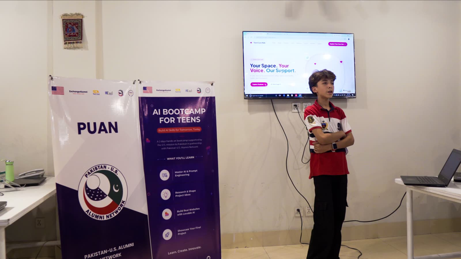A Cohort 2 teen builder presenting the Teen Care Hub project on screen