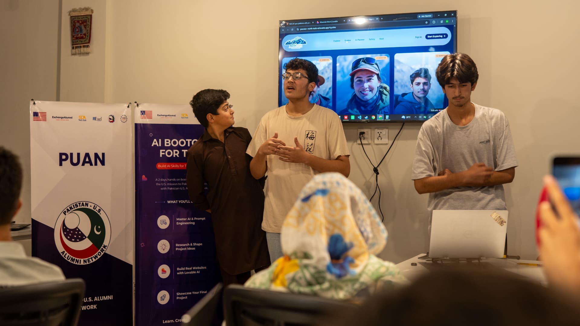 Bootcamp participants presenting their NorthTrails web project